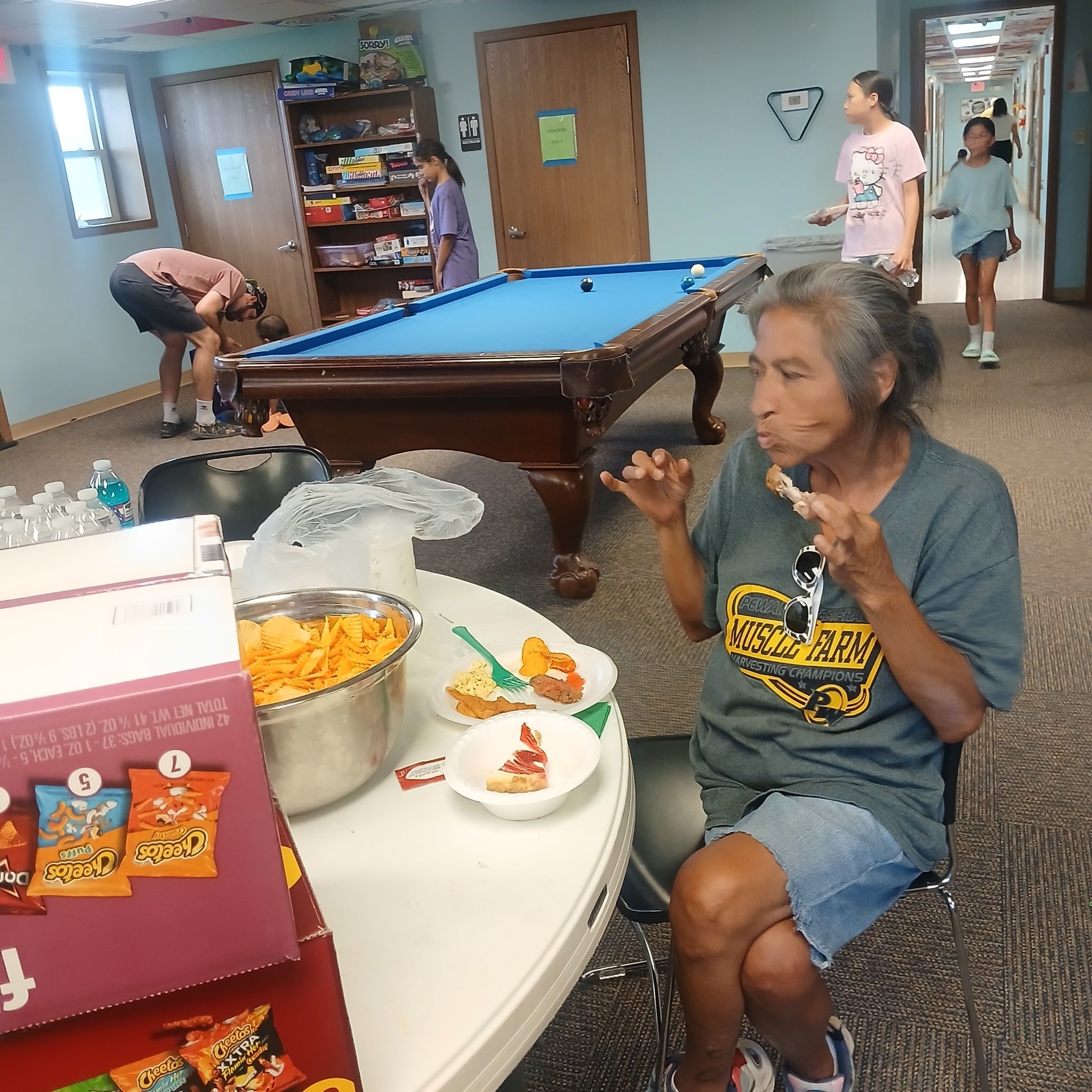 Two people talking over food at the World Cup watch party