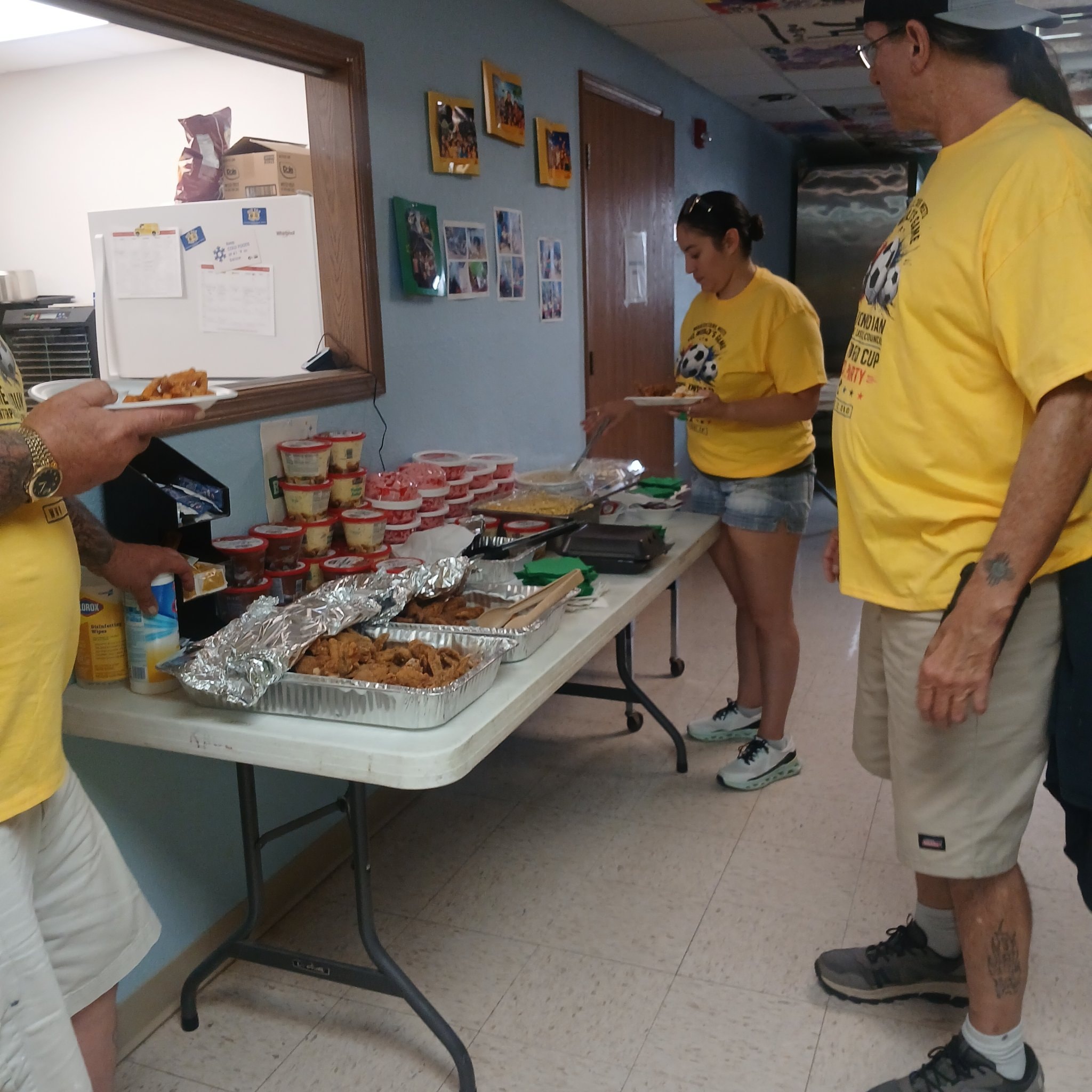 Watch party group in yellow 2026 World Cup shirts